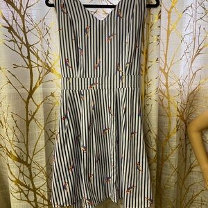 Cute little cotton dress with pockets and parrots.Above the knee.Buy one get one